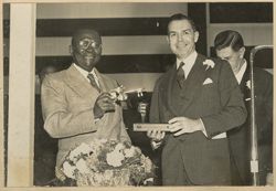 District of Columbia Commissioner Spencer presents President William V. S. Tubman a key to the city