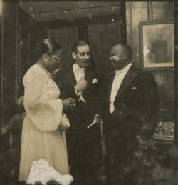 Guests converse during a formal reception