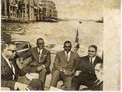 President William V. S. Tubman and Cabinet members sit in boat