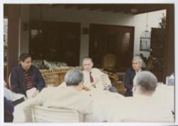 Ten-person gathering around tables, #3
