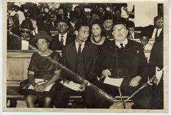 Guests sit in church during funeral service