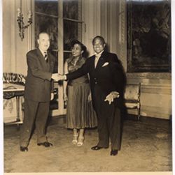Ambassador and Mrs. Knight pose for portrait with the charge d'affairs of Argentina