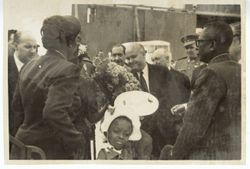 President Tubman with his daughter and dignitaries at the airport in or near Seville, Spain
