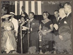 President Tubman speaks into a microphone at the Italian Insitute for Africa