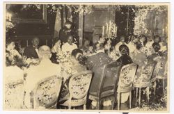 President William V. S. Tubman and guests seated at table for formal dinner