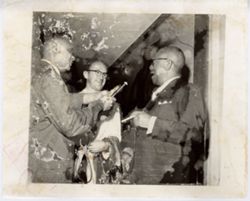 Two men interviewing President William V. S. Tubman