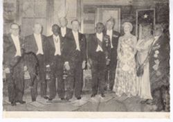 President William V. S. Tubman poses with guests and dignitaries at formal event