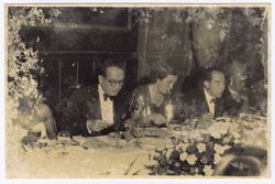 Guests seated at table for formal dinner
