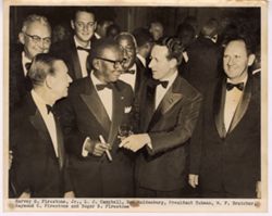 Harvey S. Firestone, Jr., L. J. Campbell, Ben Maidenburg, President Tubman, M. F. Bratcher, Raymond C. Firestone and Roger S. Firestone