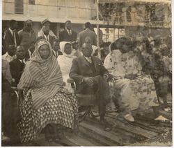 President Tubman poses for the camera while seated at docks
