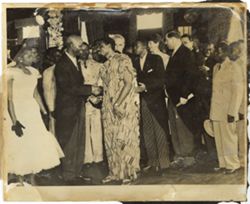 Guests at reception greet each other and mingle