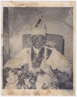 Portrait of a man in an ornate hat