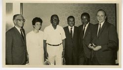 President William V. S. Tubman stands with group