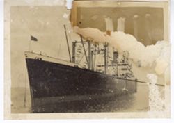 Bow of a large ship in water