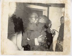 President William V. S. Tubman embraces a hug