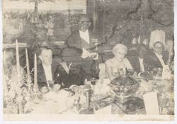 President William V. S. Tubman stands and speaks to guests during formal dinner party
