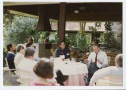 Ten-person gathering around tables, #6