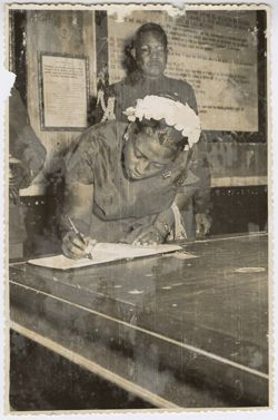 Mrs. Tubman signs a book in or near Toledo, Spain