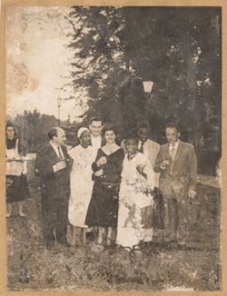 Guests pose at an outdoor reception