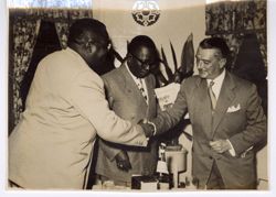 Dignitaries shake hands