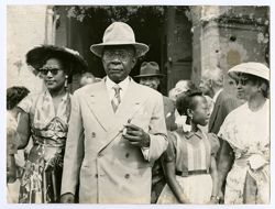 President William V. S. Tubman, Mrs. Tubman, Mrs. Tolbert, Wilhelmina (CooCoo) Tubman and others walk together outside during state visit to Italy