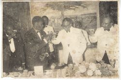 President William V. S. Tubman toasts at dinner party