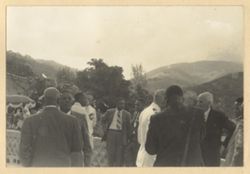 Guests at party mingle together
