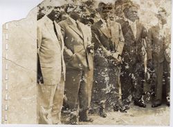 President William V. S. Tubman stands with officials