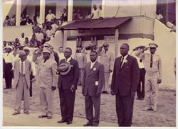 President Tubman, General Judson Greene, and Senator Harrison Gribsby lined up paying their respects during Sinoe county visit