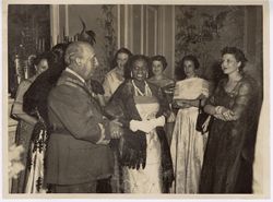 General Franco chatting with Mrs. Tubman and guests
