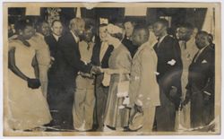 Wife of an ambassador is presented to the Secretary of State at the executive pavilion