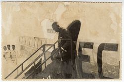President Tubman decends stairs from an airplane