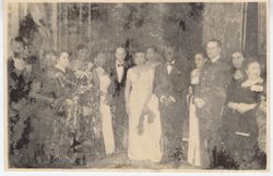 President Tubman posing for portrait with guests in formal attire