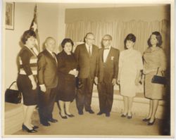 Mrs. Leonard Epstein, Mr. Leonard Epstein, Mrs. Katriel Katz, Hon. Katriel Katz, Consul General David M. Thomas, Mrs. Thomas and Eugenina A. Stevenson pose for portrait