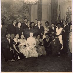 Ambassador and Mrs. Knight pose with students and friends