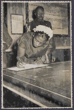 Mrs. Tubman signs a book in or near Toledo, Spain