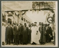 President William V. S. Tubman stands with large group during Welcoming ceremony