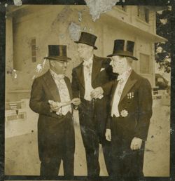 Secretary of the Treasury William E. Dennis, Sr. with Harvey S. Firestone, Jr. at the Executive Mansion during President Tubmans' 1952 Inuaguration