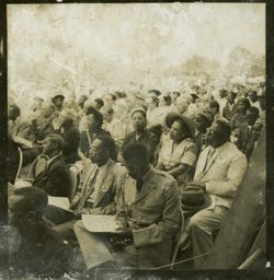 Crowd seated outdoors