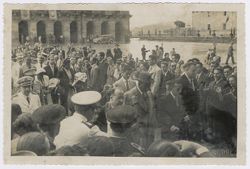 President Tubman, Spanish and Liberian dignitaries walk through a crowd