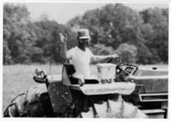Bearded man on tractor