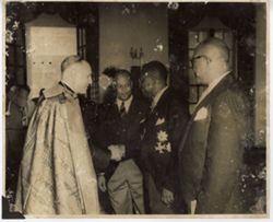 President William V. S.Tubman and officials greet a Catholic religious leader