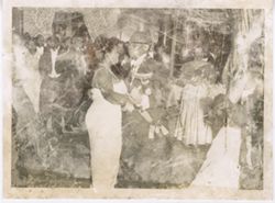 President William V. S. Tubman and Mrs. Tubman dance at a formal event