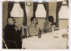 Dignitaries seated at a table
