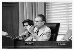 Hamilton speaking in meeting room