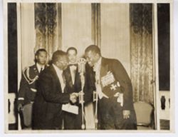 President William V. S. Tubman shakes hands Haitian President Paul Magloire