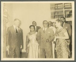 President William V. S. Tubman and Mrs. Tubman acommpanied by Chief of Protocol James Morgan and General J.H. Dickerson stand with others