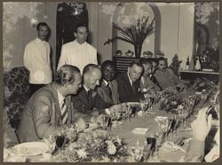 J. Rudolph Grimes and other dignitaries seated at a luncheon in Fregene