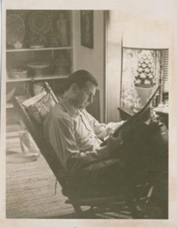 Hamilton at home, reading