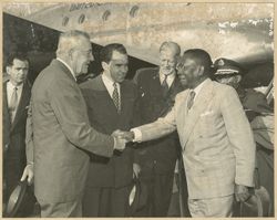 Secretary of State Dulles, Vice President Nixon, Chief of Protocol Simmons greet President William V. S. Tubman followed by Aide de Camp, Brigadier General  Brewer